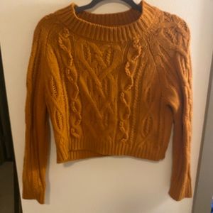 Cropped woven knit burnt orange sweater
